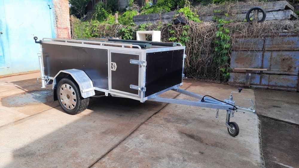 Прицеп , причіп для перевозки собак.