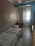 Quarto individual em Gambelas para rapariga estudante