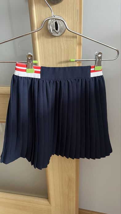 Plisowana granatowa  spódniczka Okaidi 128 roz