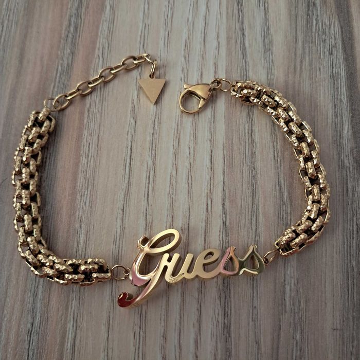 Nowa Bransoletka marki Guess. W kolorze zlotym.