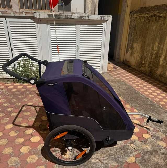 Atrelado de bicicleta para crianças