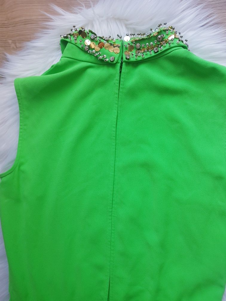Neonowy kombinezon damski marki Missing In Clothes rozmiar XS/S.