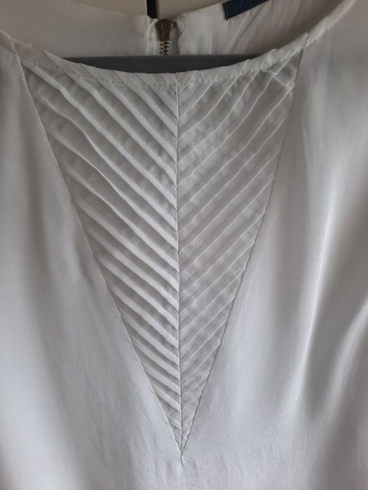 Blusa branca com detalhe no peito da Tiffosi