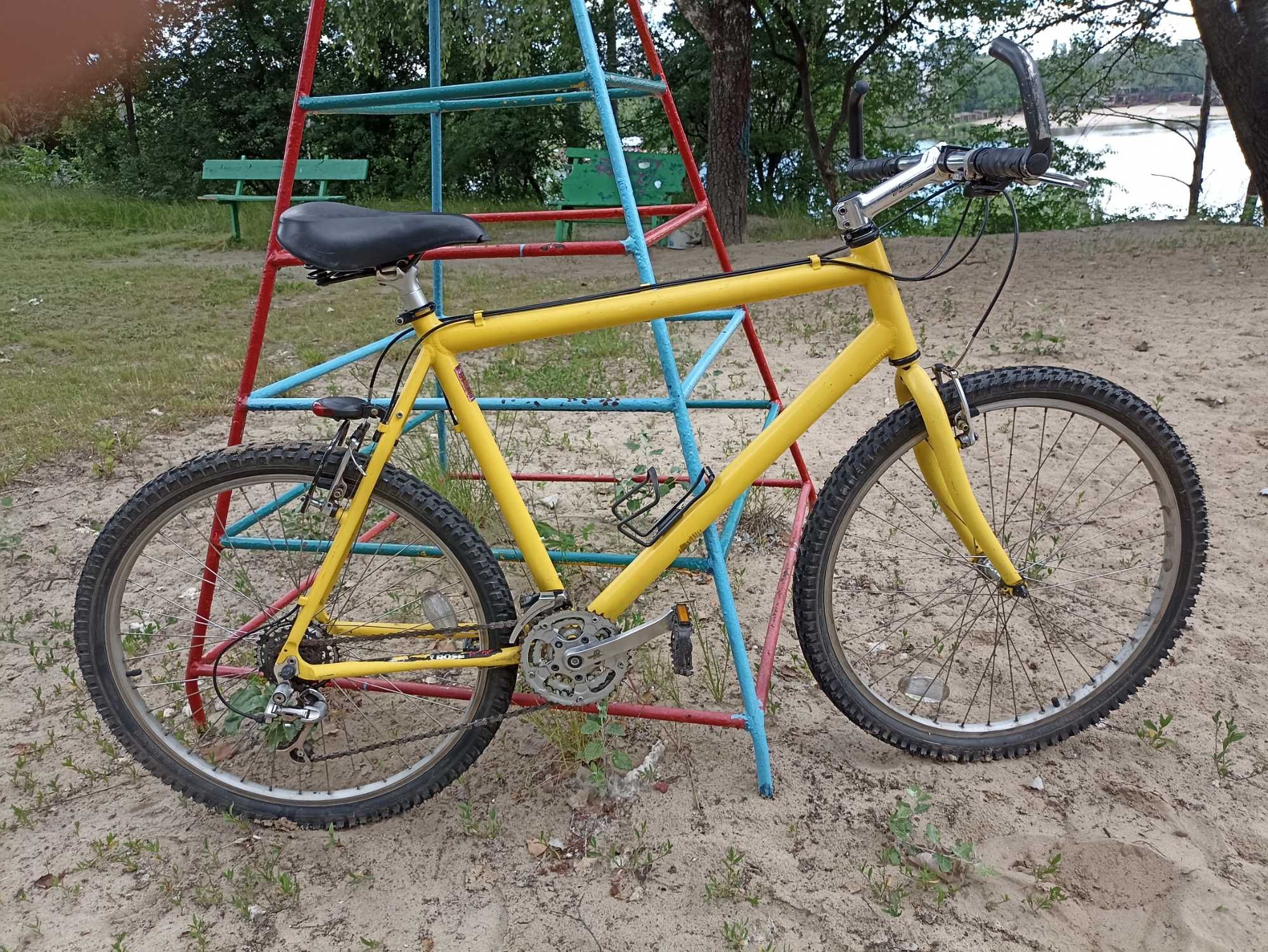 Продам алюминиевый велосипед Trek 26"желтый в хорошем состоянии