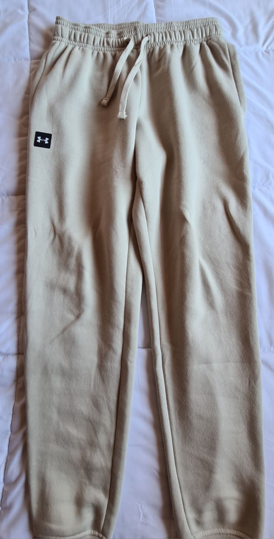 Calça fato treino Under Armour.