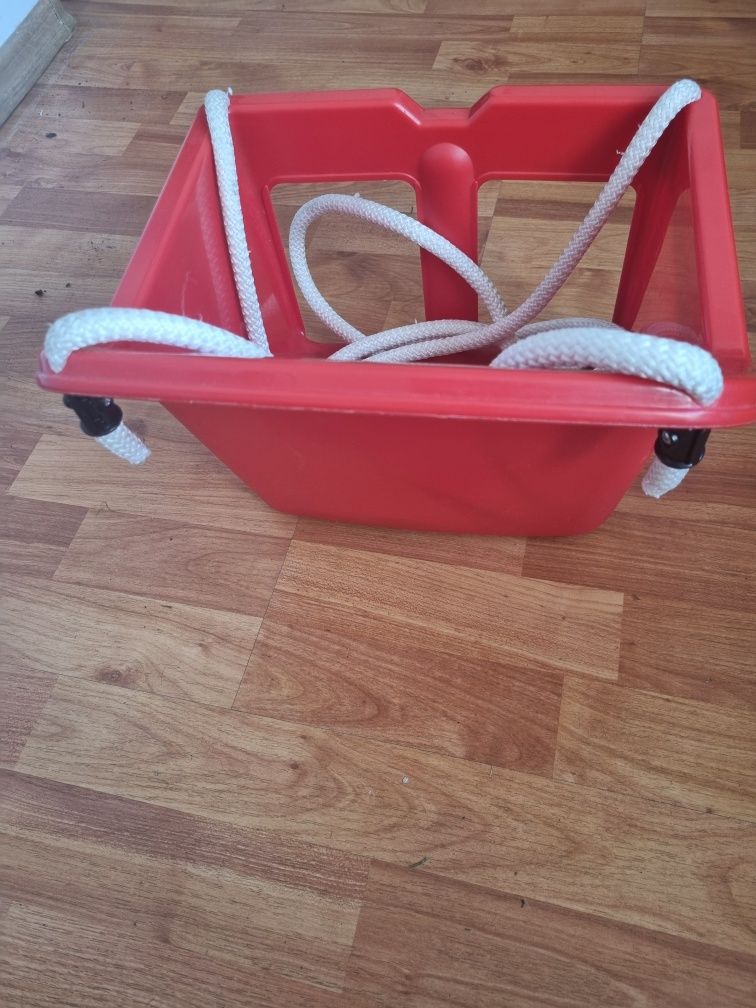 Bujaczka huśtawka dla dziecka czerwona