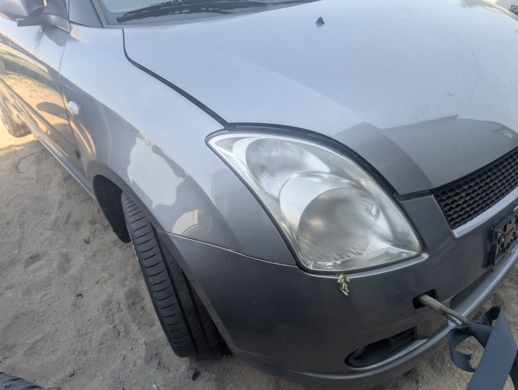 Zderzak maska pas przedni błotnik prawy lewy zcd uzuki Swift mk6