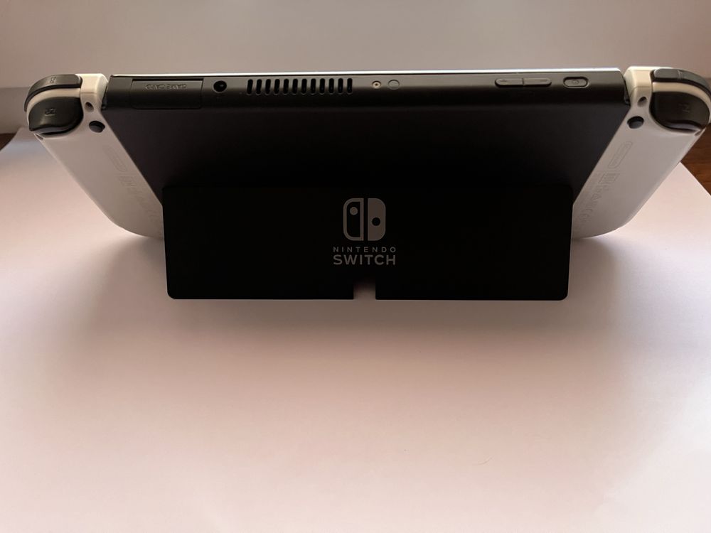 Nintendo Switch OLED + 6 gier + pokrowiec | Pokémon, Mario, FIFA