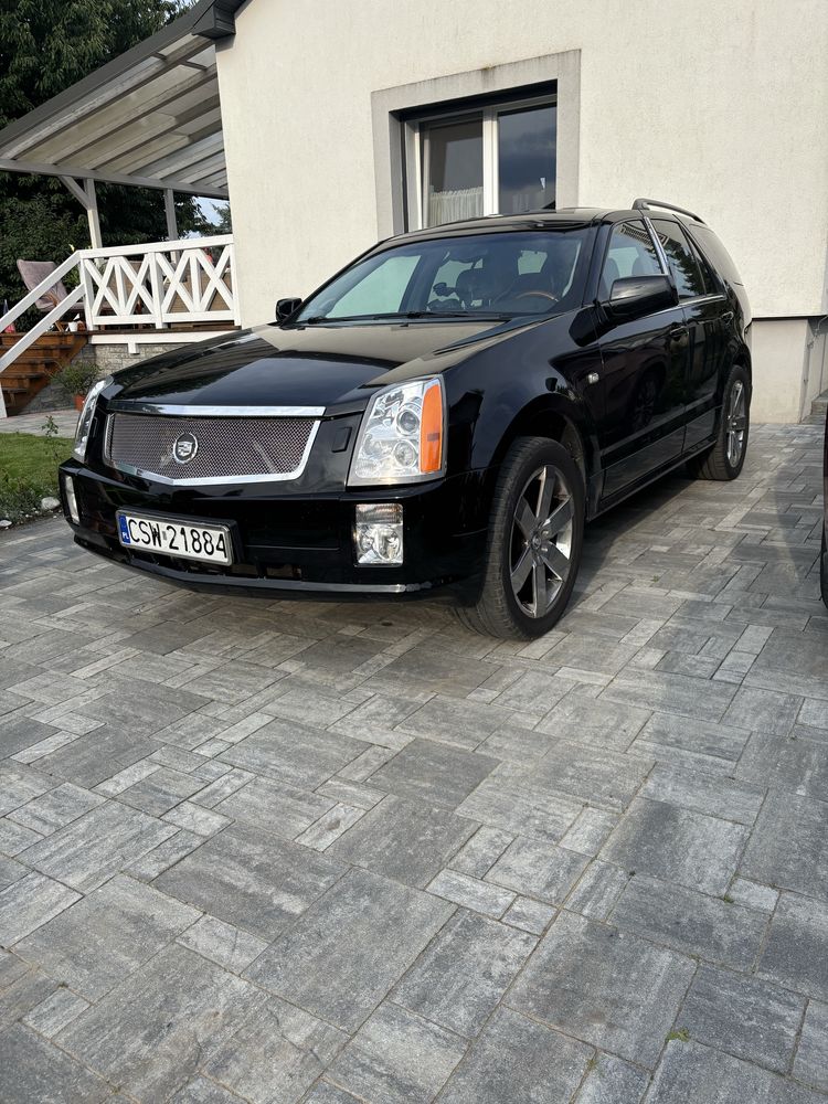 Cadillac SRX 2004r 4.6 benz