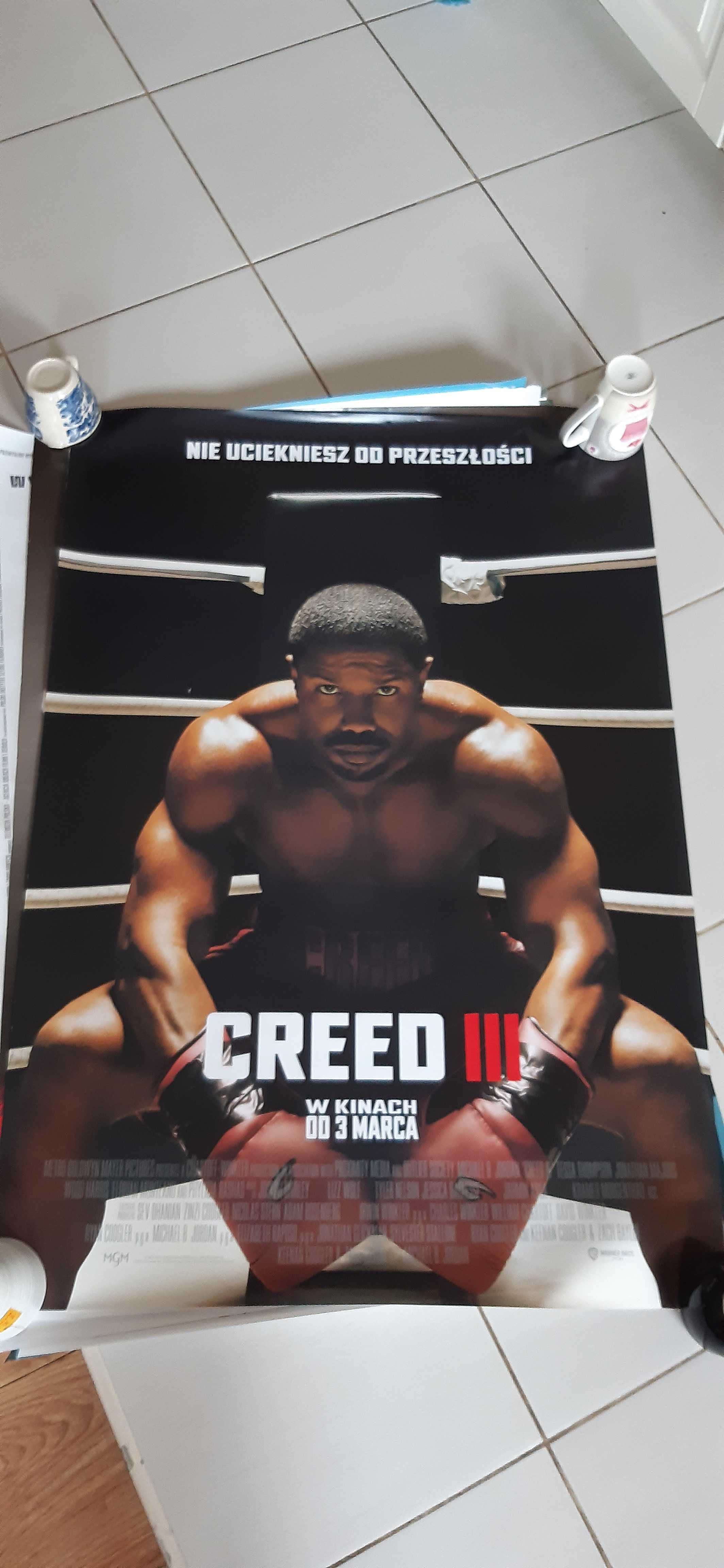 stary plakat filmowy z filmu bokserskiego creed 3