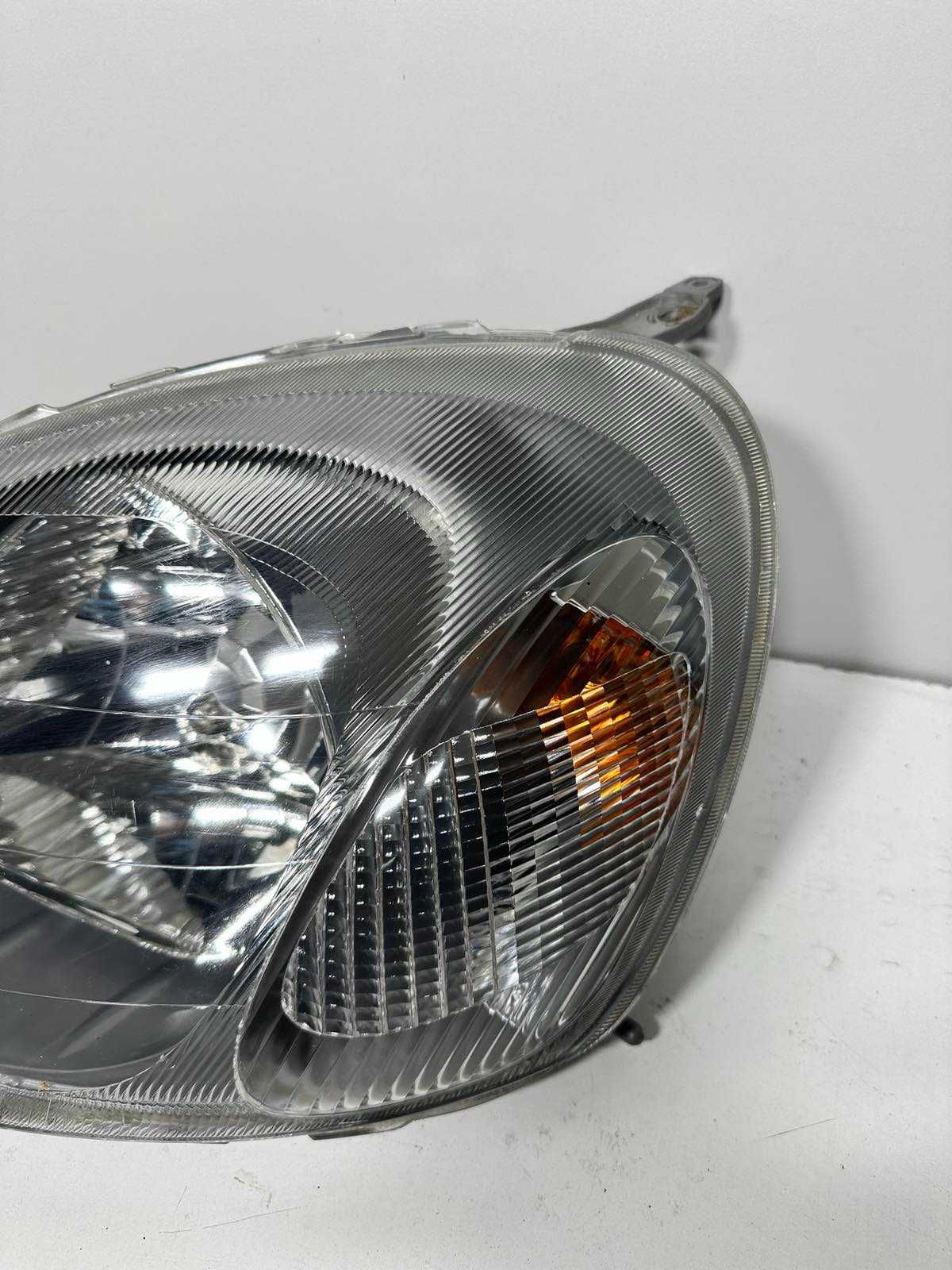 Toyota Yaris I Prawy Lewy reflektor lampa zwykła EUROPA cana za 1 st