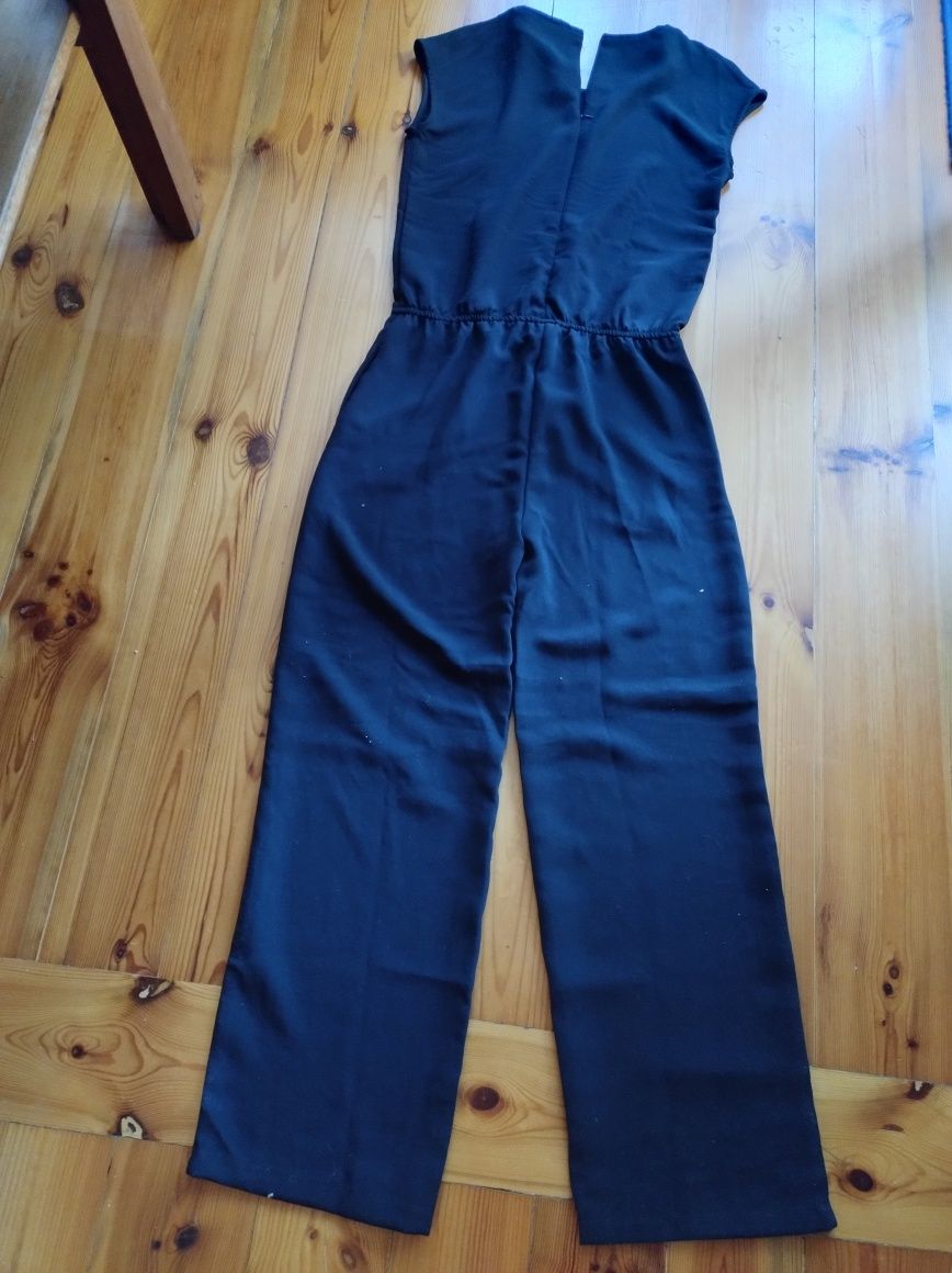 Elegancki kombinezon damski 40 /42 mowy