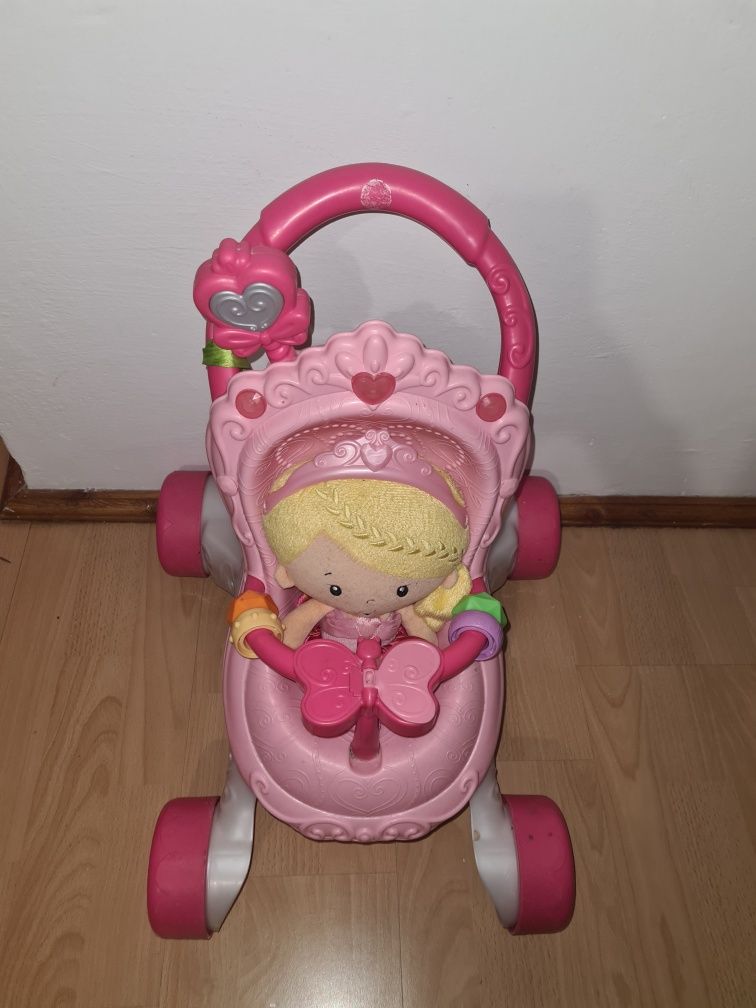 Wózek pchacz z lalką grąjacy fisher price