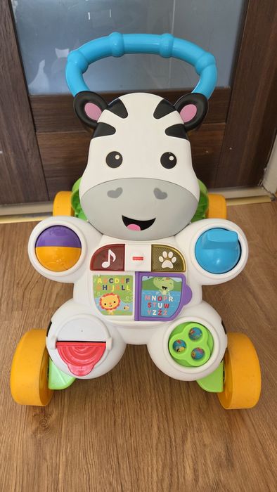 Chodzik pchacz interaktywny Fisher Price