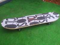 Skateboard Deskorolka drewniana dł.79cm
Stan bardzo dobry minus.