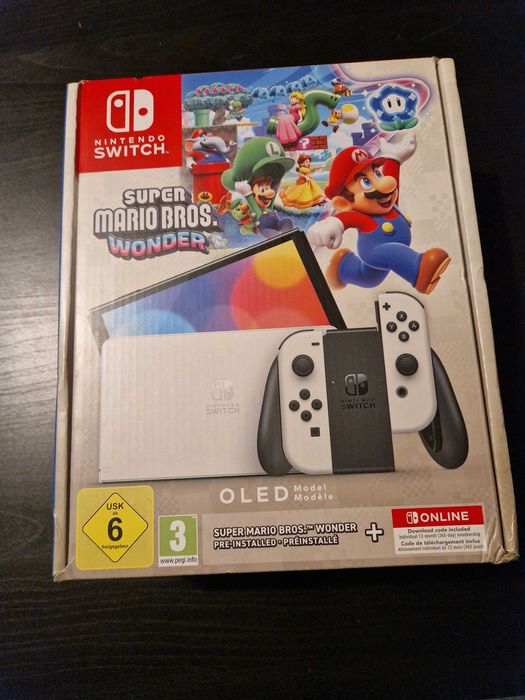 Nintendo Switch Oled + Super Mario Bros. Wonder + 12 meses de Online
