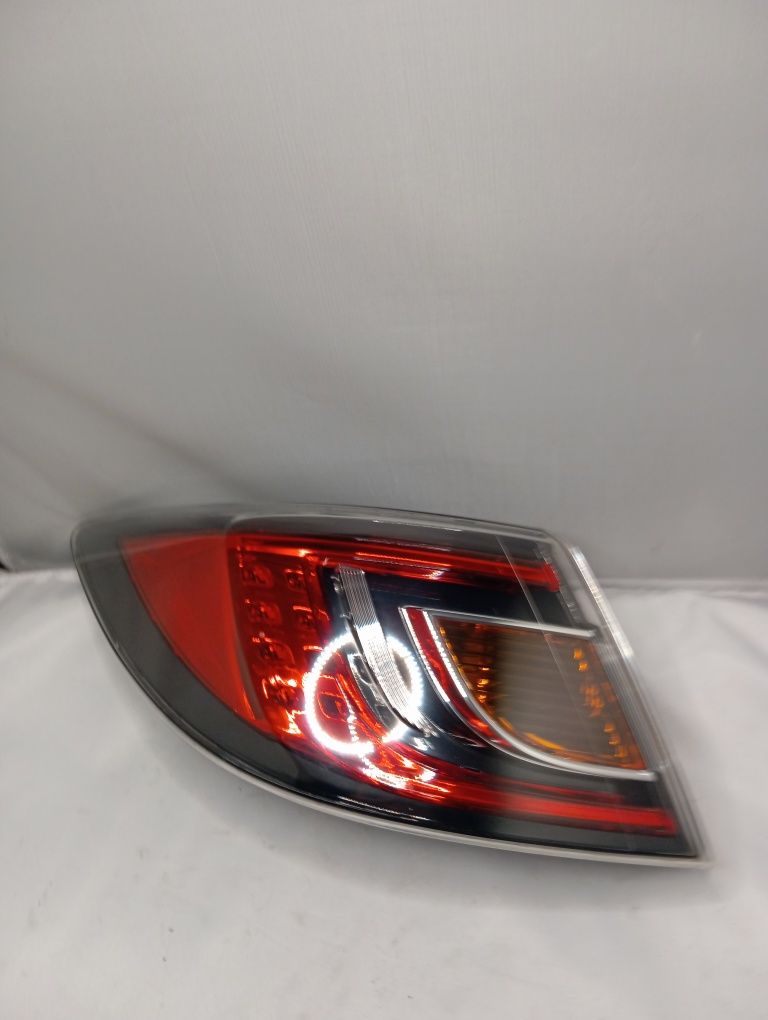 Lampa tył tylna lewa Mazda GH sedan