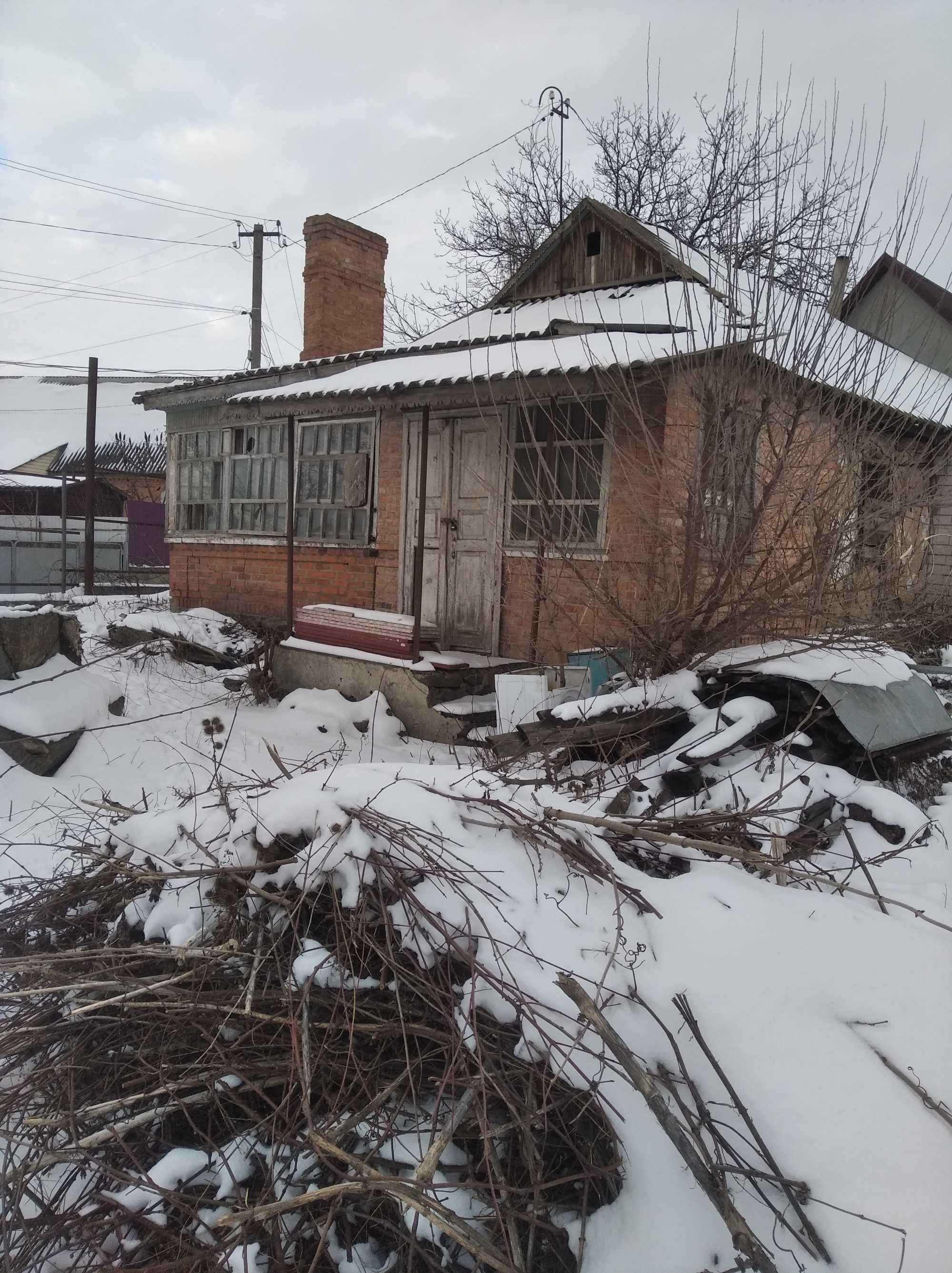 Частина будинку + земельна ділянка з часткою будинку під знос