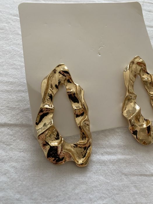 Brincos dourados ovais Shein