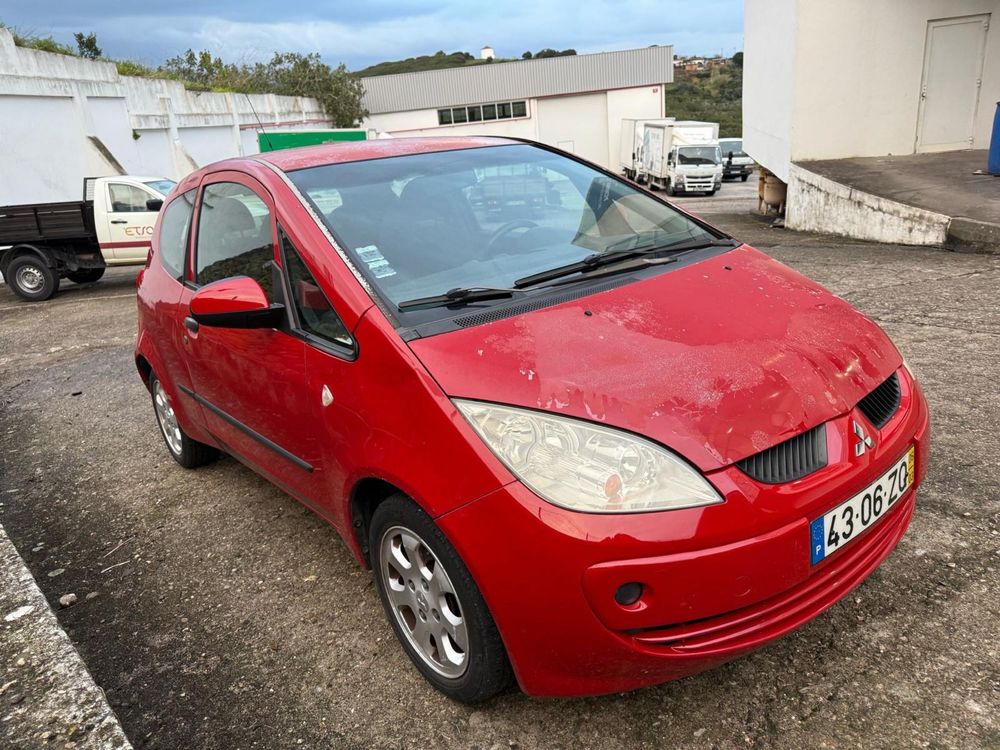 Mitsubishi colt 1.1 CZ3 c/ ar condicionado  2005