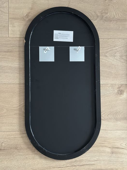 Lustra owalne w ramie