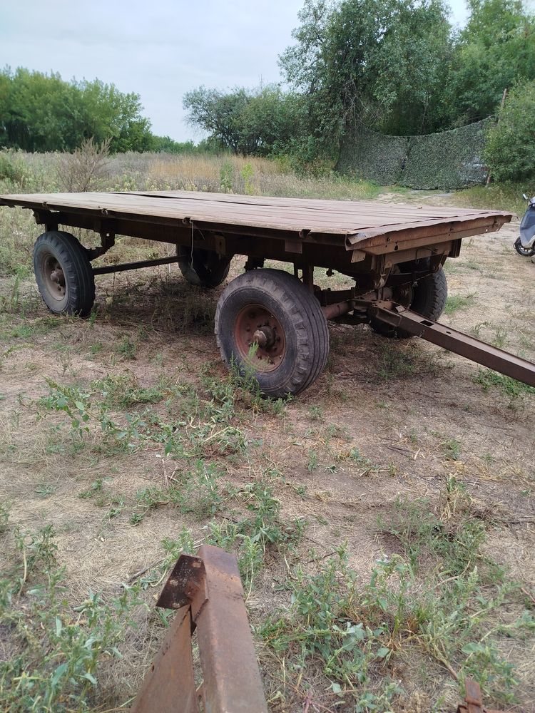 Тракторный прицеп 2ПТС4 на тягах