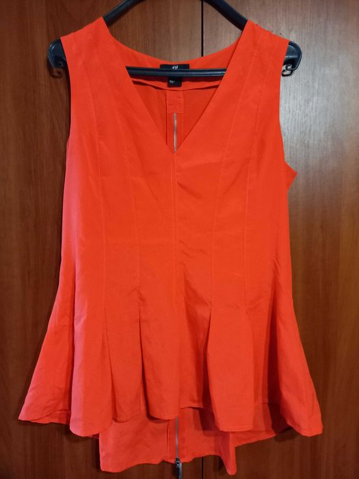 Блуза рожева з баскою бренда Н&М