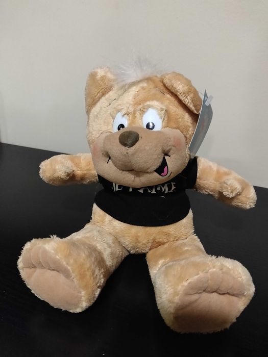 Ursinho de peluche com mensagem "Je t'aime"