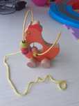Brinquedo bebé galinha