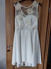 Biała rozkloszowana sukienka