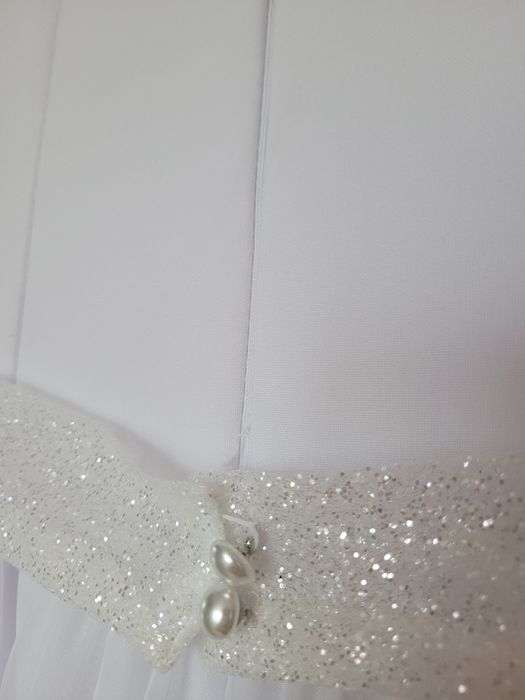 Sukienka komunijna biała literka A lekko rozkloszowana bolerko torebka