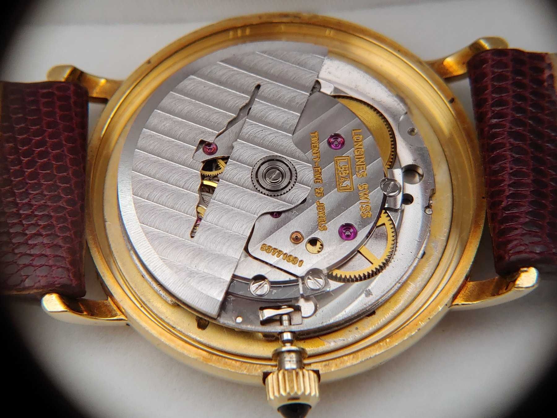 złoty zegarek longines 18k automat