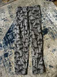 H&M joggers spodnie dinozaury pull on 128