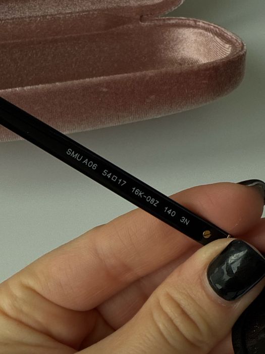 Окуляри MIU MIU