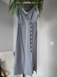 Niebieska prążkowana sukienka na naramkach r. M