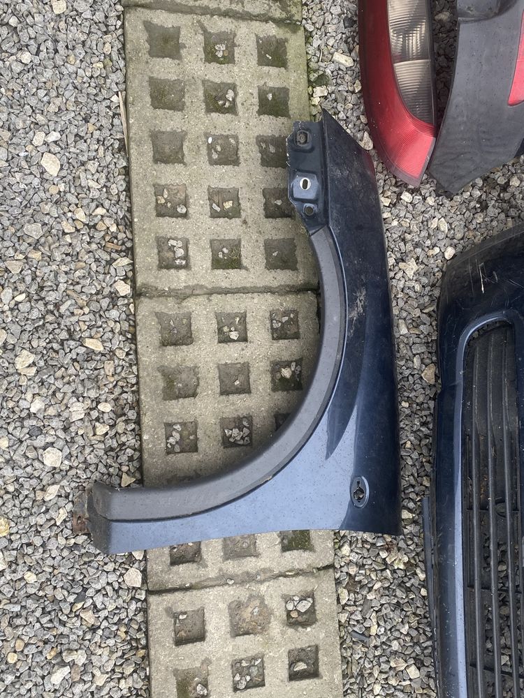 Opel Corsa C lampy, zderzak, blotnik, licznik