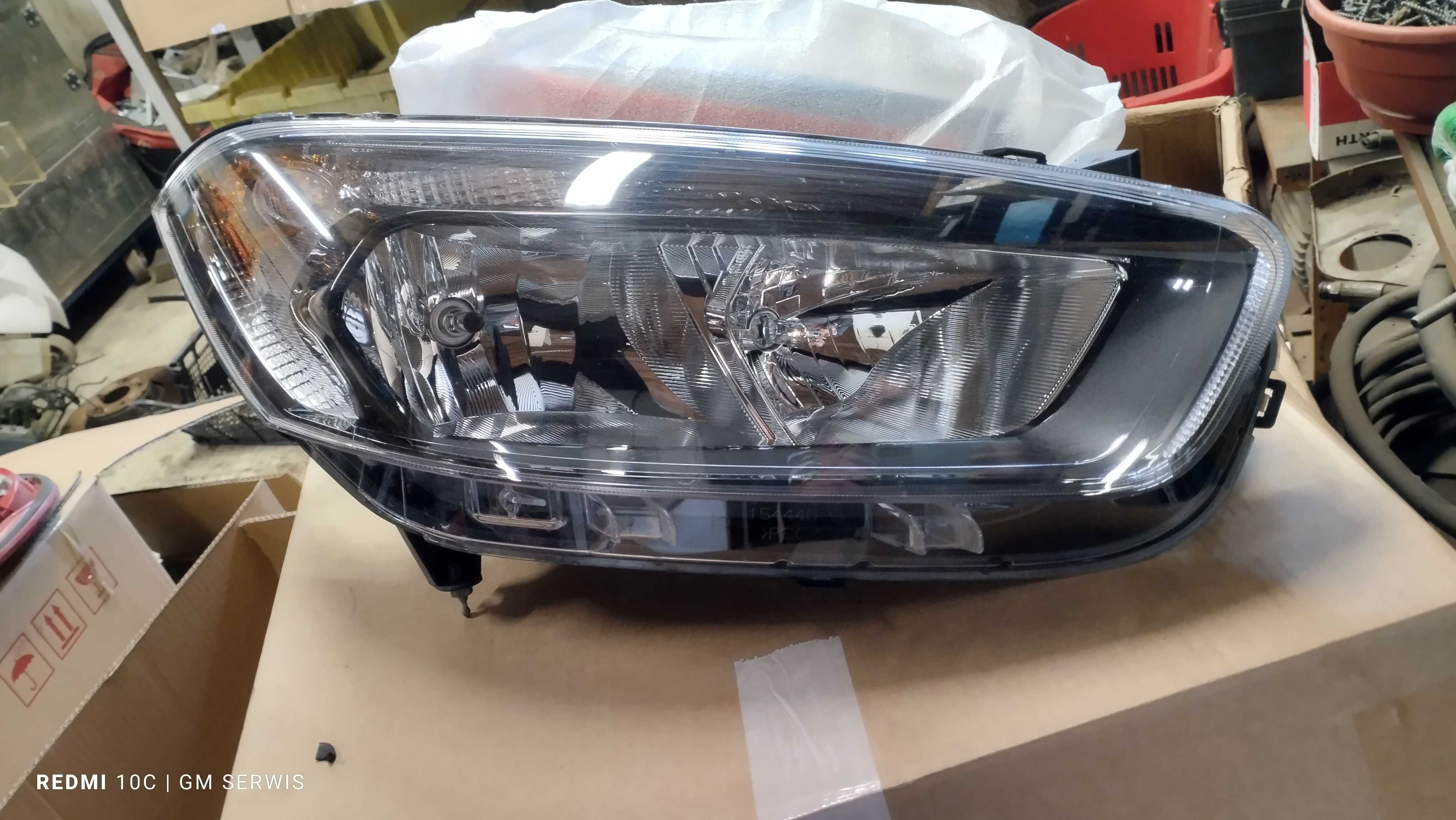 Ford  courier 18- lampa reflektor prawy jt76-13w029-cd