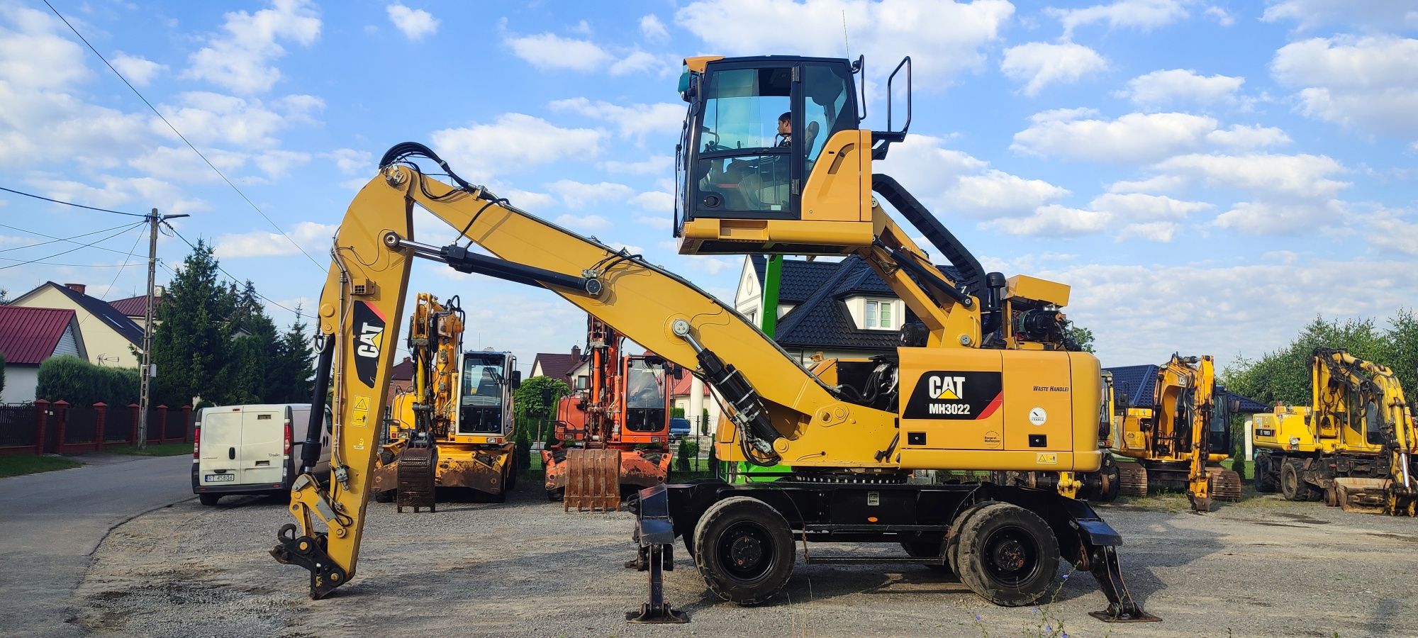 Koparka przeladunkowa CAT MH 3022 koparka do złomu fusch liebherr cat