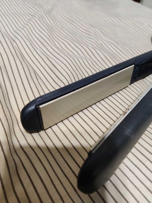 Prancha alisadora Remington 150/230