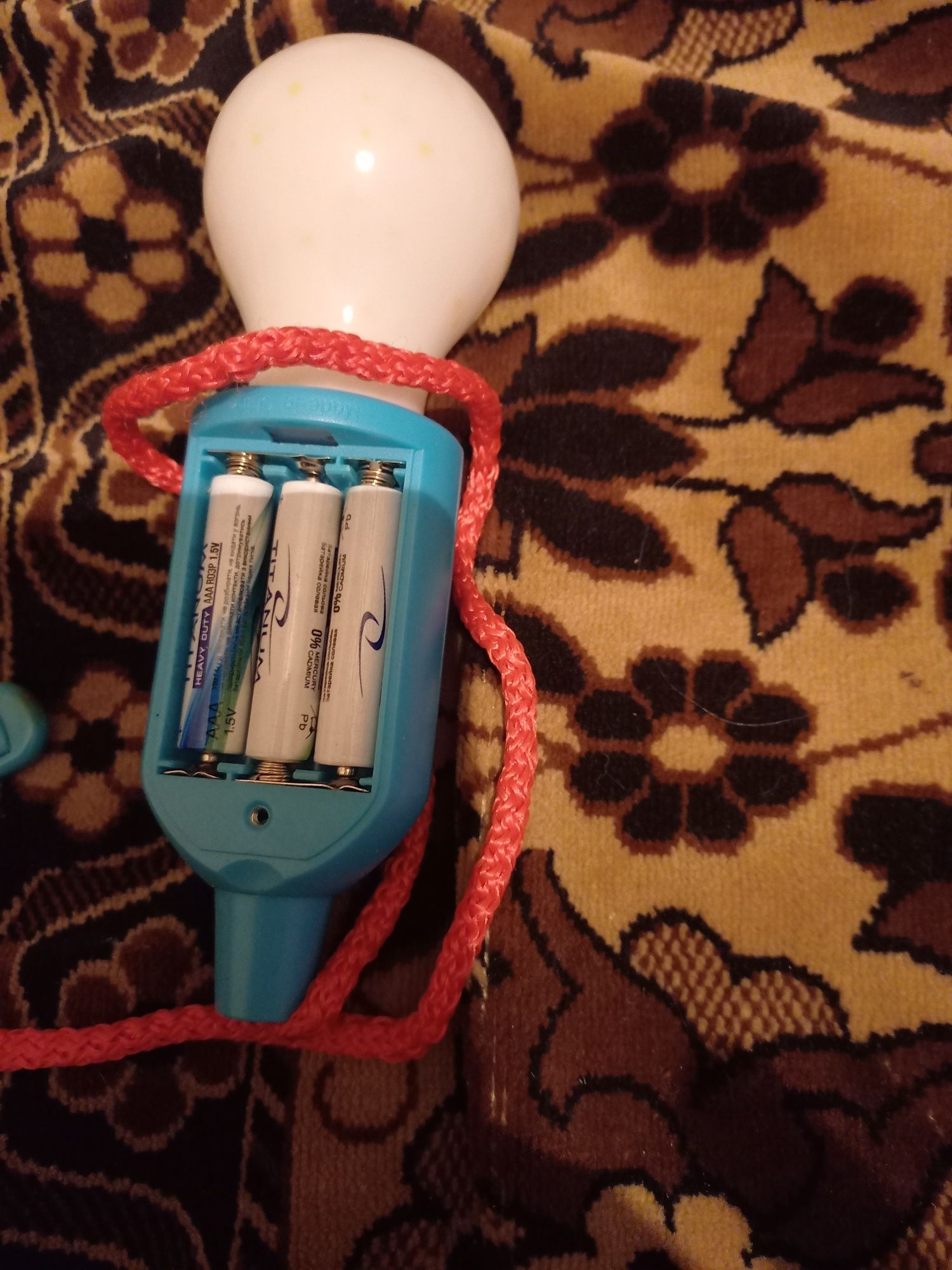 Музыкальная игрушка,лампа светодиодная на шнурке