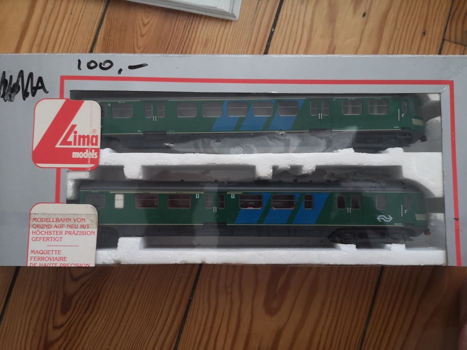 Composição da marca Lima, dos caminhos de ferro Holanda