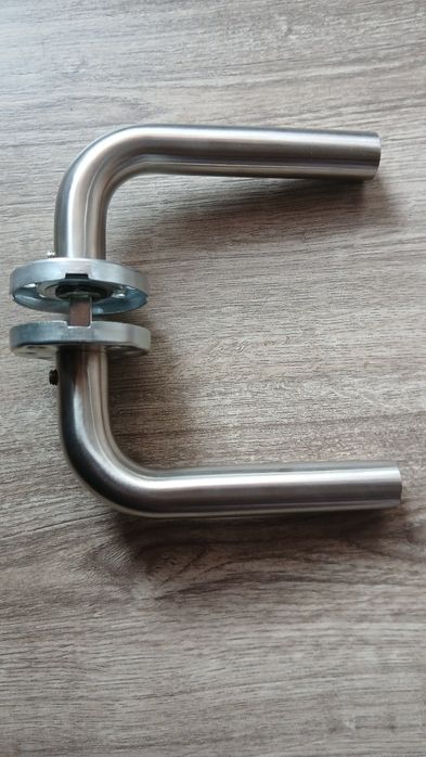 Puxador em inox.