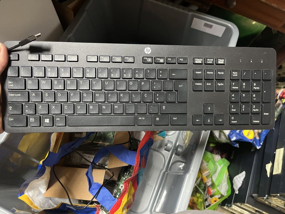 Teclados para computador com leitor