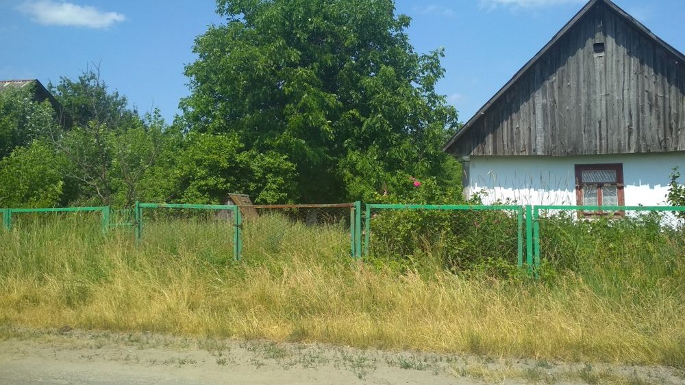 Продам ділянку з будинком