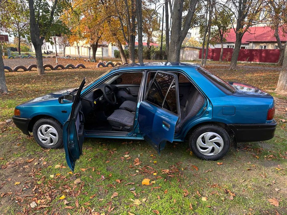 Mazda 323 расход 7л/100км