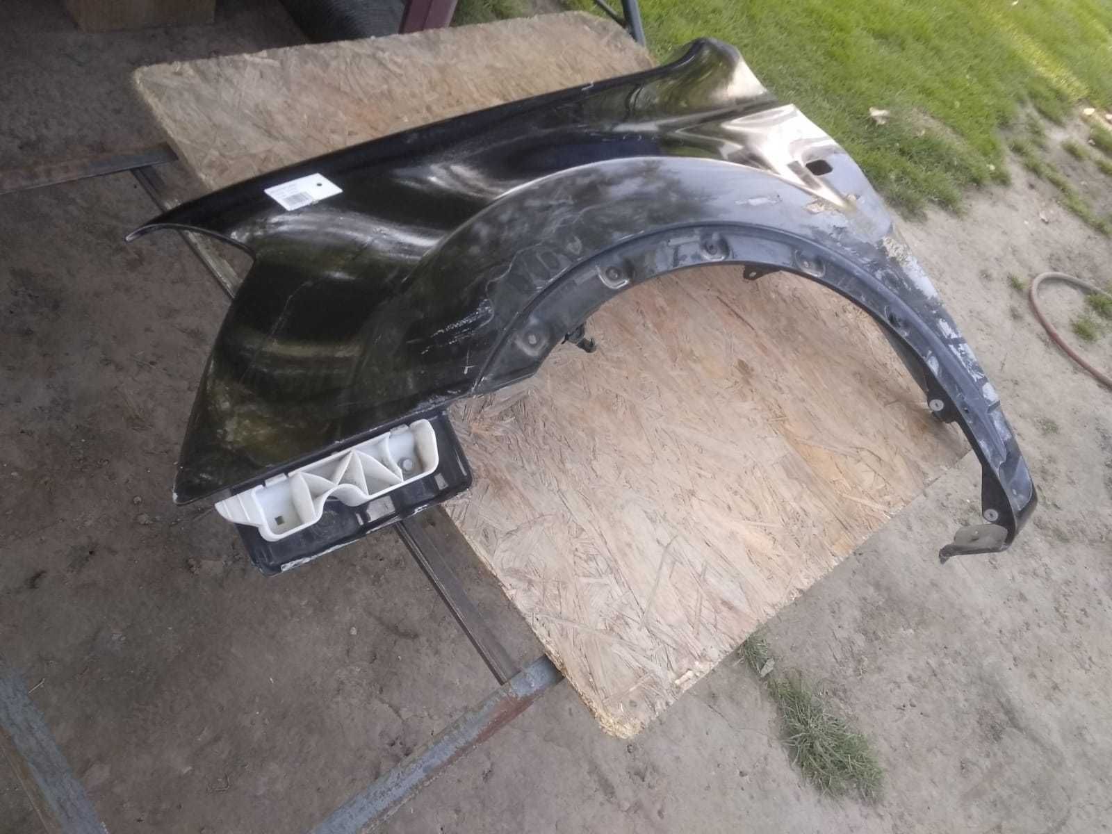 błotnik lewy nissan qashqai z11g