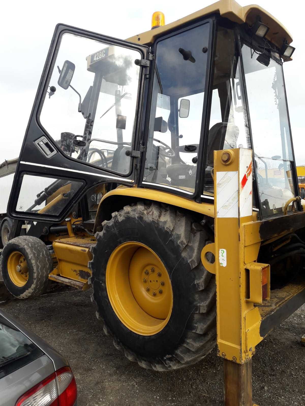 Koparko-ładowarka CAT 428C
