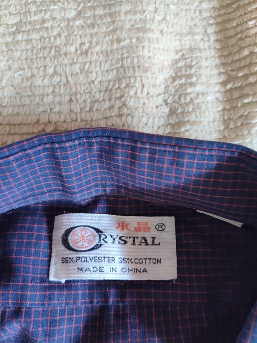 Męską fioletową koszula w kratę