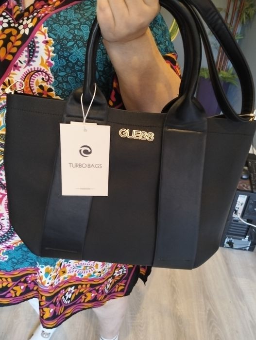 Mala guess  tiracolo e maos