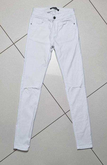Spodnie białe damskie z dziurami na kolanie XS